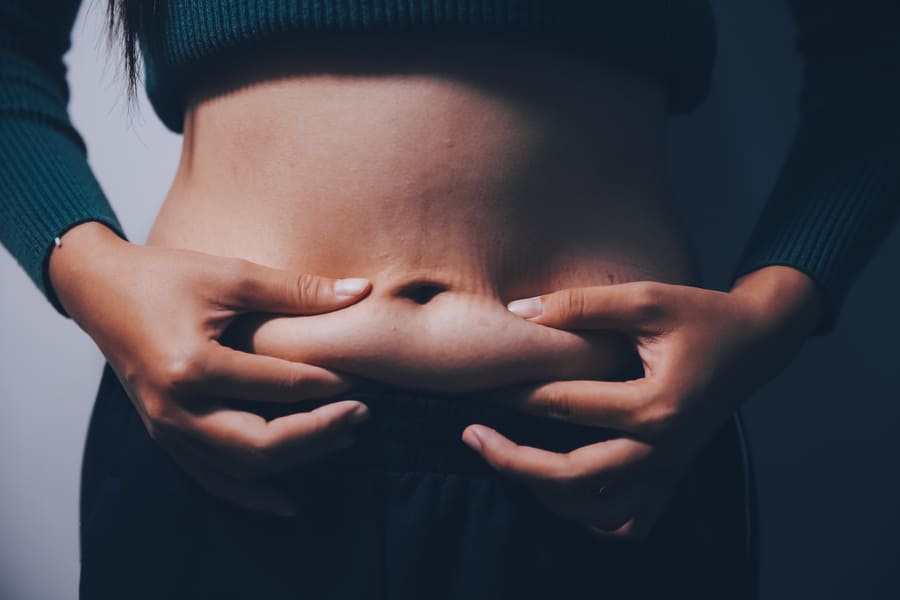 causes of sagging belly